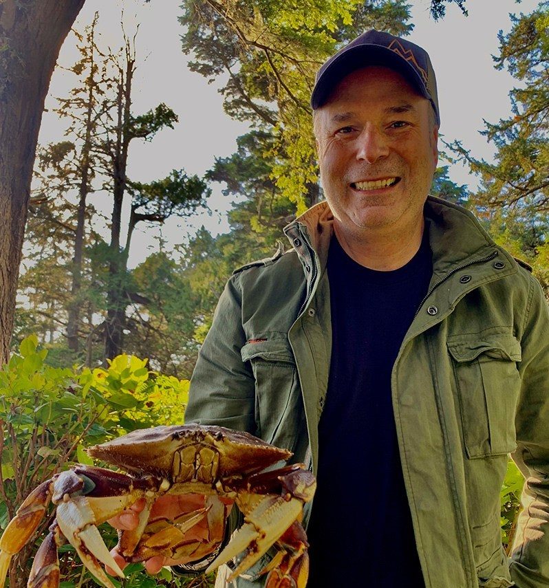 https://ericpateman.com/wp-content/uploads/2020/05/Eric-Pateman-with-crab-in-Tofino-798x1200-1-e1590429121305.jpg